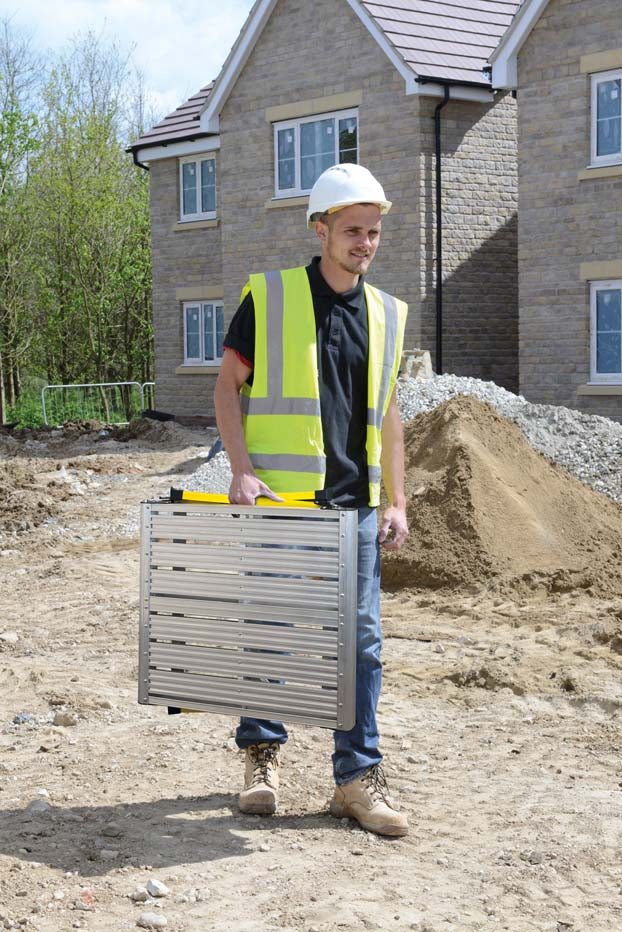 Construction Worker Holding Zarges GRP 600 Hop Up