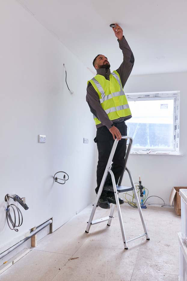 Werner High Handrail Platform Step Ladder - 3 Tread - In Use