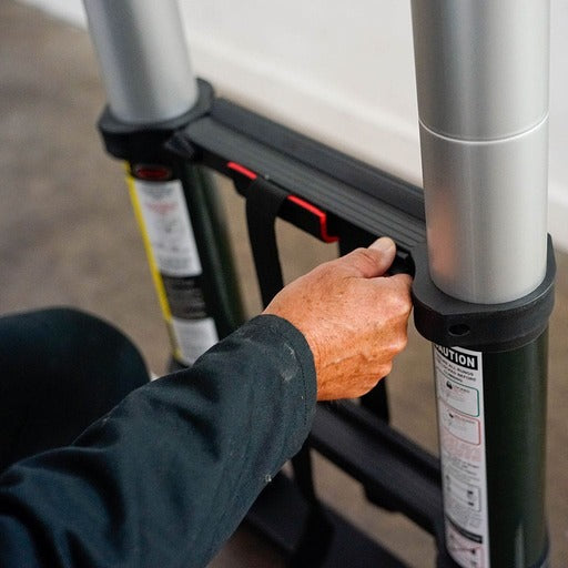 Man using the lightening lock system on ladder