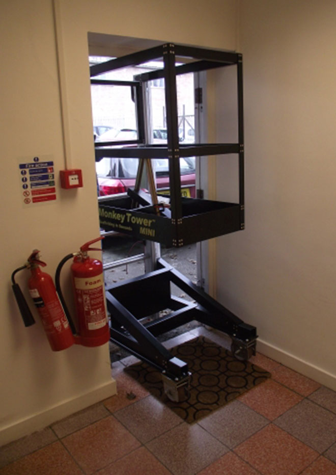 Mini Monkey Tower Through Doorway