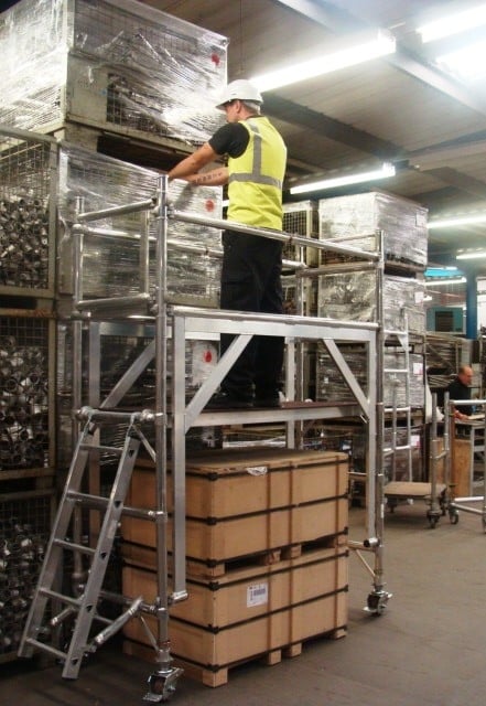 Euro Towers High Clearance Unit - 2m Length - In a warehouse positioned over crates